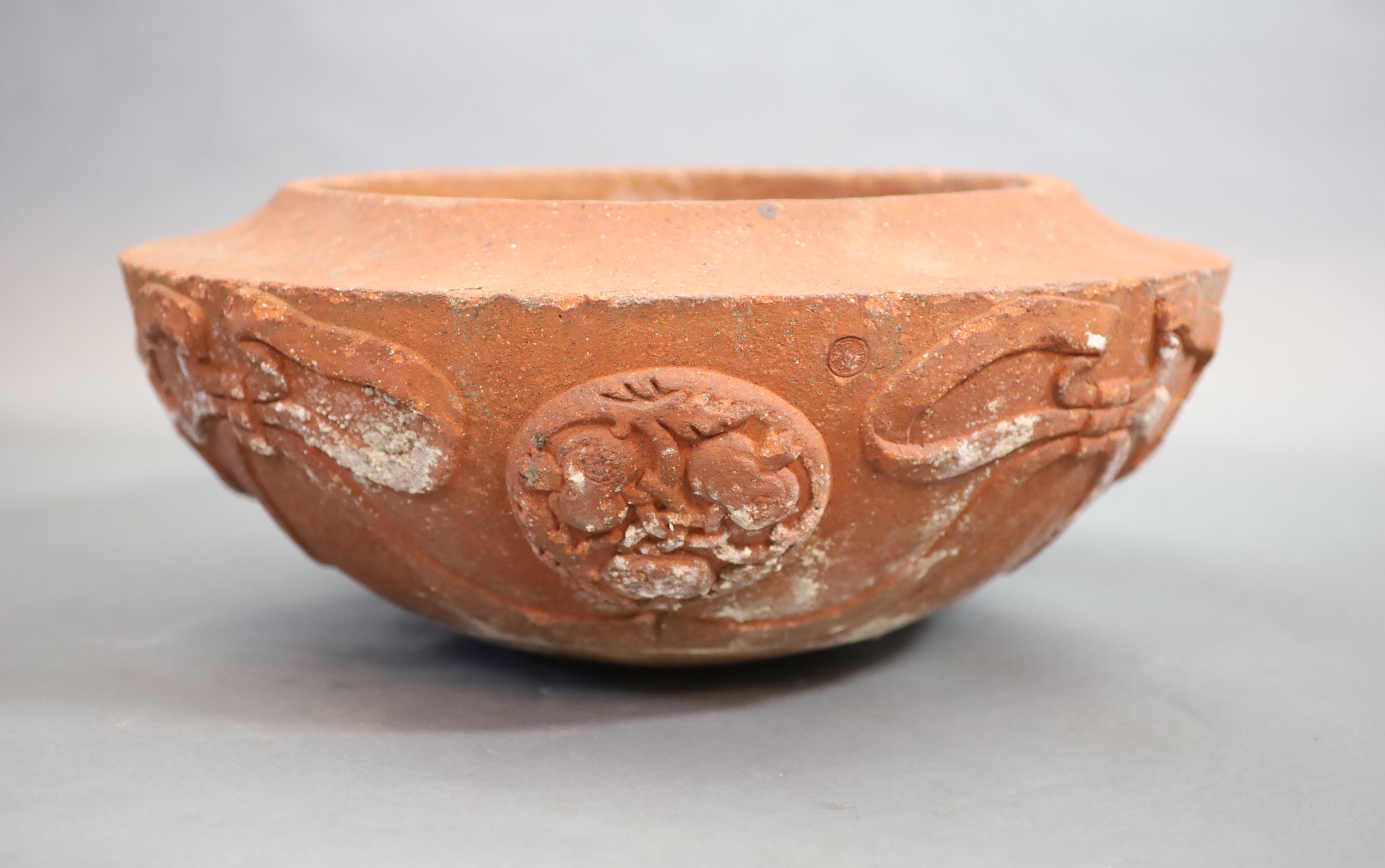 A Compton pottery ‘seasons’ terracotta planter, early 20th century, height 18cm 55cm diameter